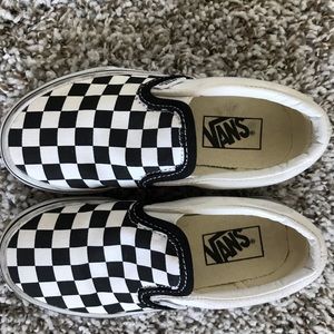 Black and white checkered vans.